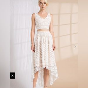 Two piece white and beige lined lace skirt and top set